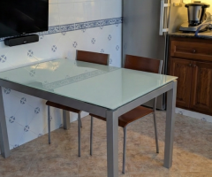 Mesa de cristal extensible