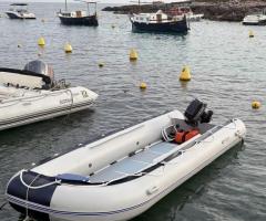 Barca neumatica de 5m con motor de 6CV opcional.